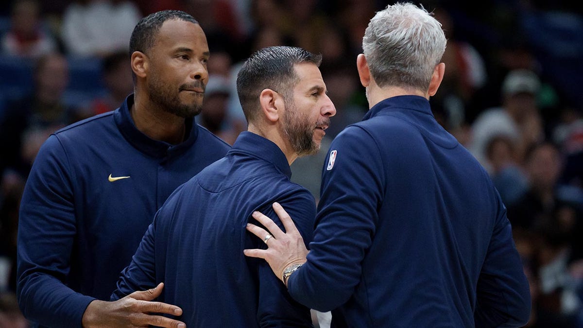 James Borrego is held back