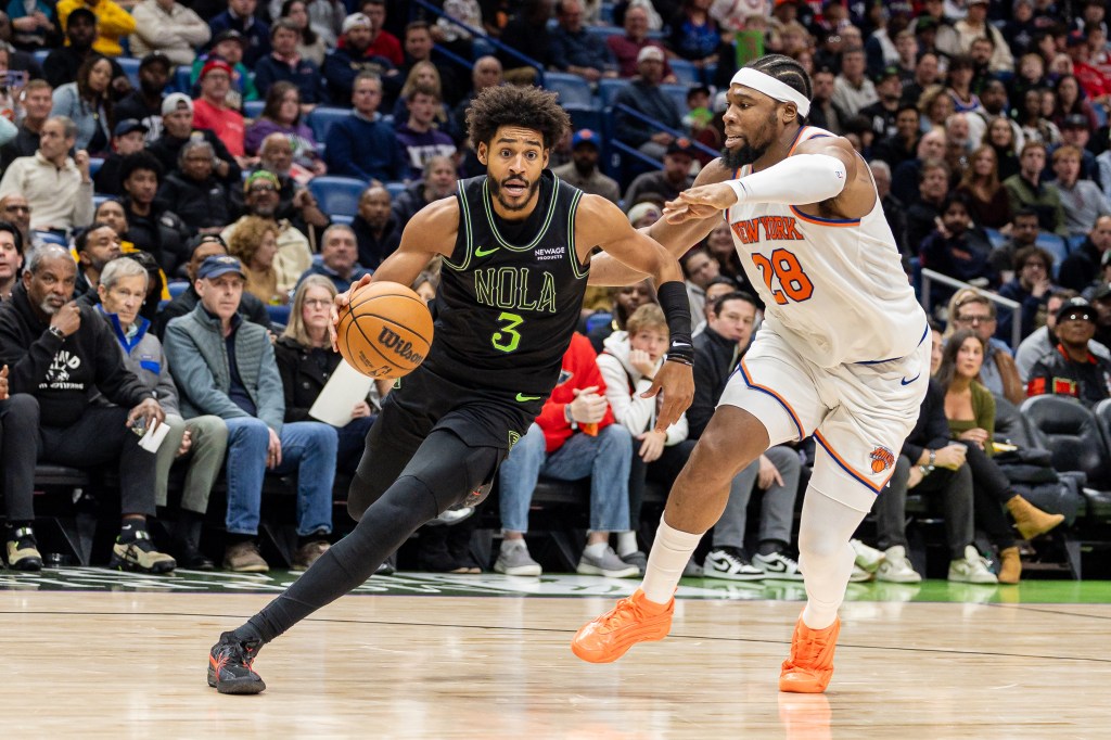 Pelicans guard Jordan Poole (3) dribbles against New York Knicks forward Guerschon Yabusele (28) during the second half at Smoothie King Center.