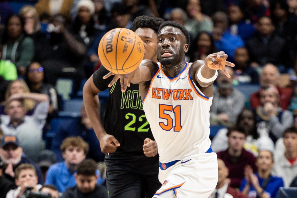 Knicks forward Mohamed Diawara (51) passes the ball against New Orleans Pelicans center Derik Queen (22) during the first half at Smoothie King Center.