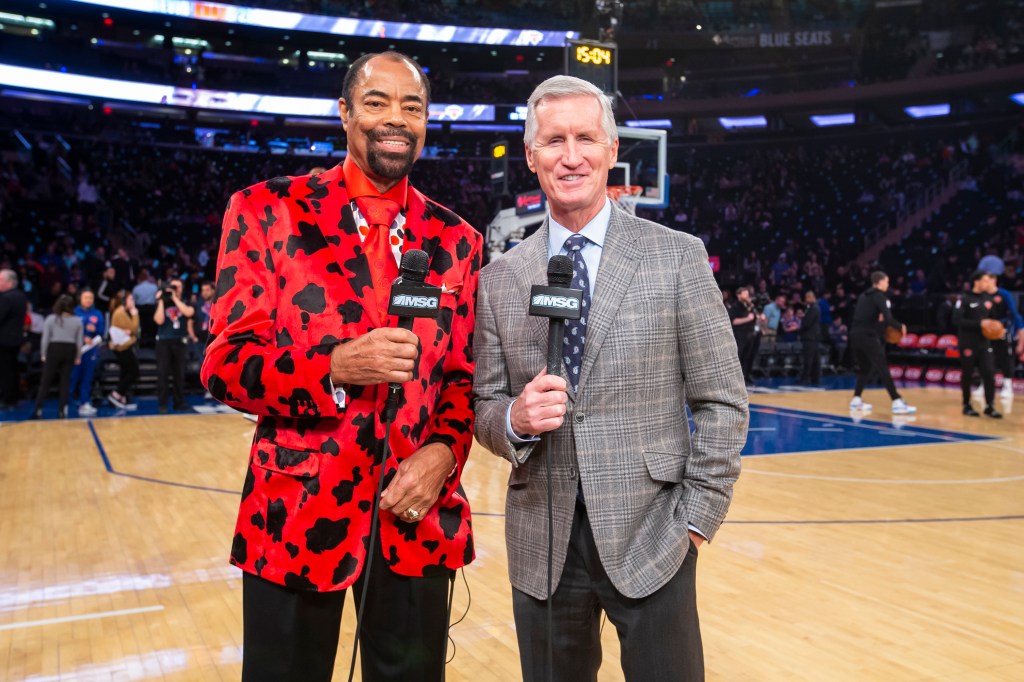 MSG Knicks announcers Walt "Clyde" Frazier and Mike Breen on the court.