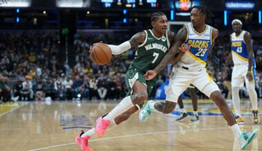 Milwaukee Bucks guard Kevin Porter Jr. (7) moves around Indiana Pacers guard Quenton Jackson (29) during the second half of an NBA basketball game in Indianapolis, Tuesday, Dec. 23, 2025.
