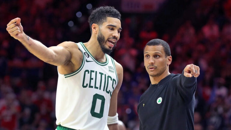The Celtics Jayson Tatum (left) and head coach Joe Mazzulla (right) confer on the sidelines during the fourth quarter. The Boston Celtics visited the Philadelphia 76ers for Game Six of their NBA Eastern Conference Semi Final basketball series at the Wells Fargo Center.