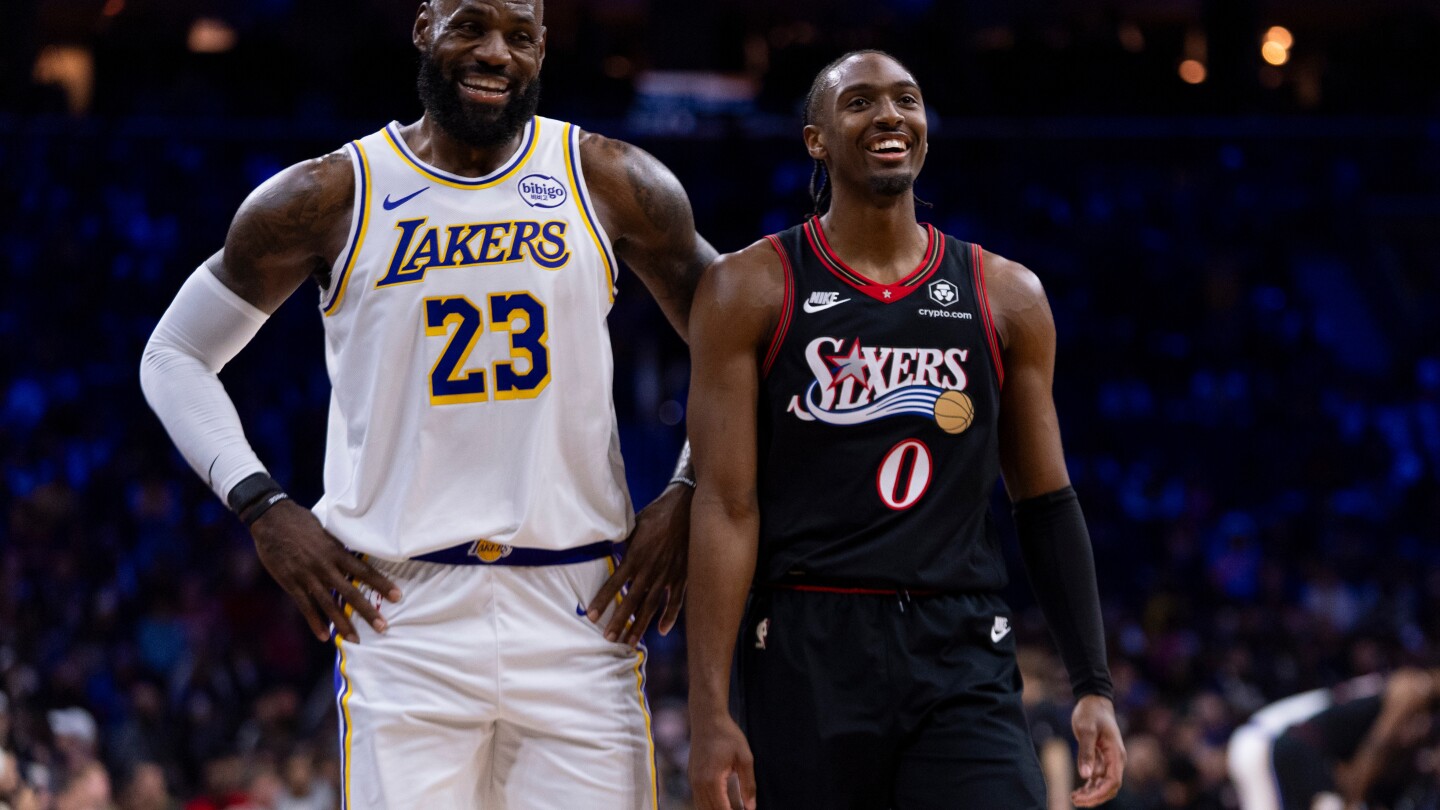 LeBron James' clutch 3-pointer lifts Lakers over 76ers in thriller