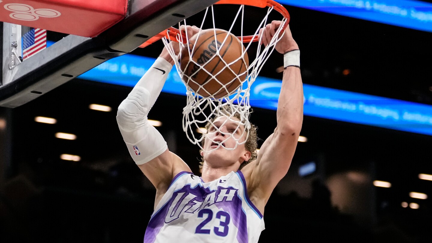 Jazz use big fourth quarter to beat the Nets 123-110