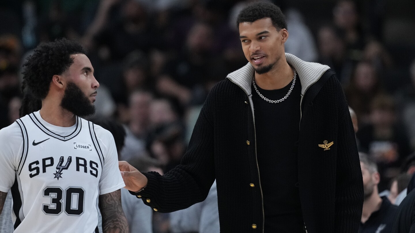 Victor Wembanyama to miss at least 2-3 weeks with strained left calf, AP source says