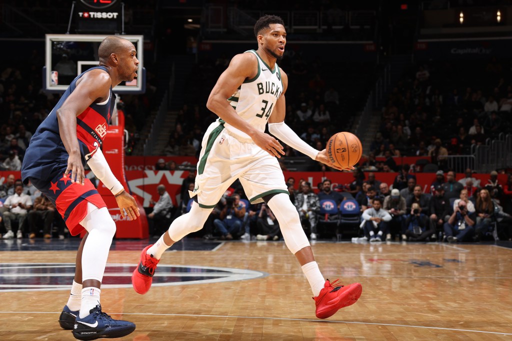 Giannis Antetokounmpo of the Milwaukee Bucks looking to pass the ball against the Washington Wizards.