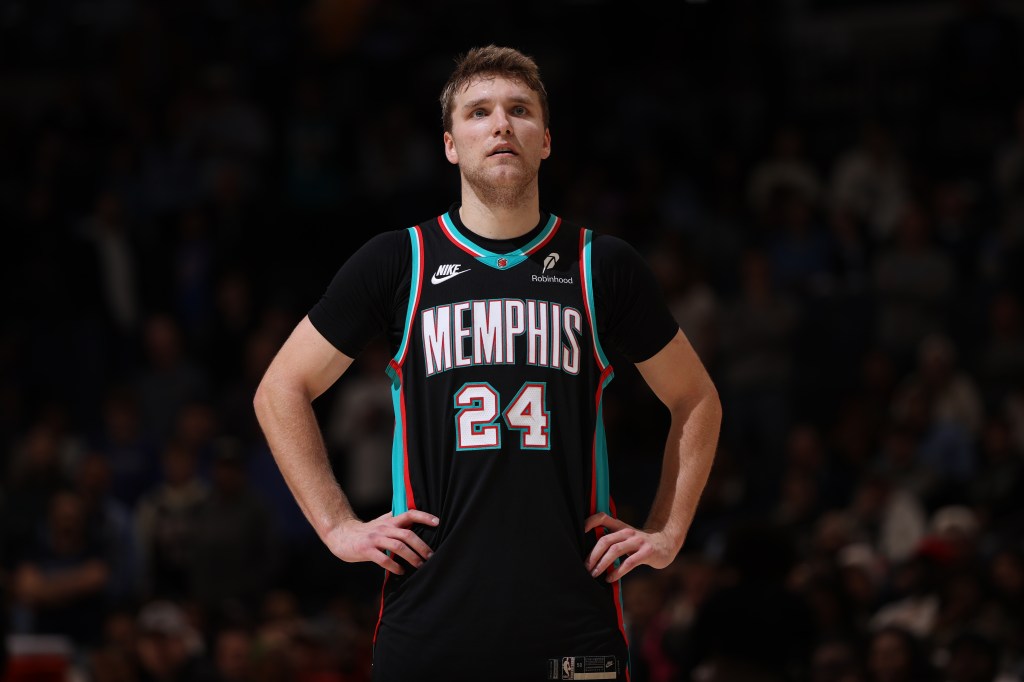 Cam Spencer #24 of the Memphis Grizzlies looking on during the game.