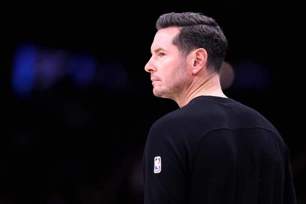Head coach JJ Redick of the Los Angeles Lakers looking on during a game.