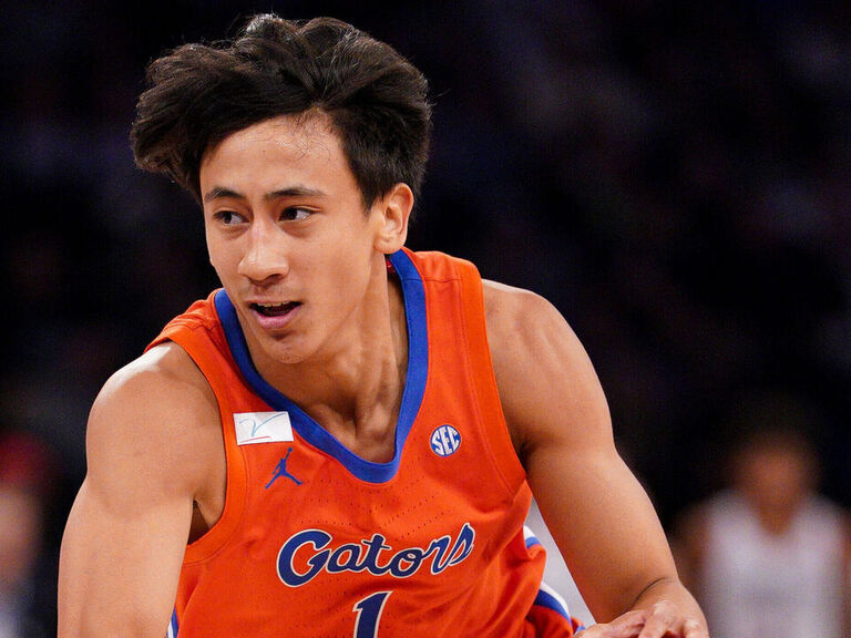 Lee scores 24 to lift No. 18 Florida past George Washington