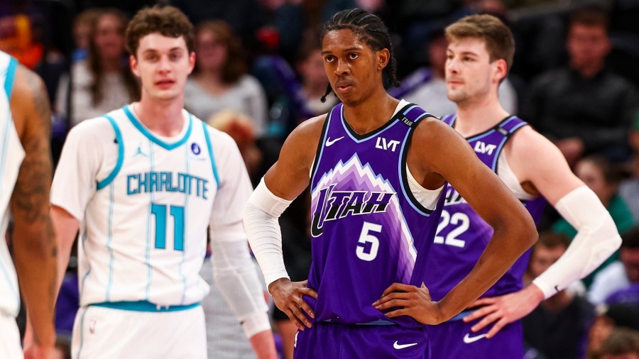 Utah Jazz forward Cody Williams (5) looks on during the second half of an NBA game against the Char...