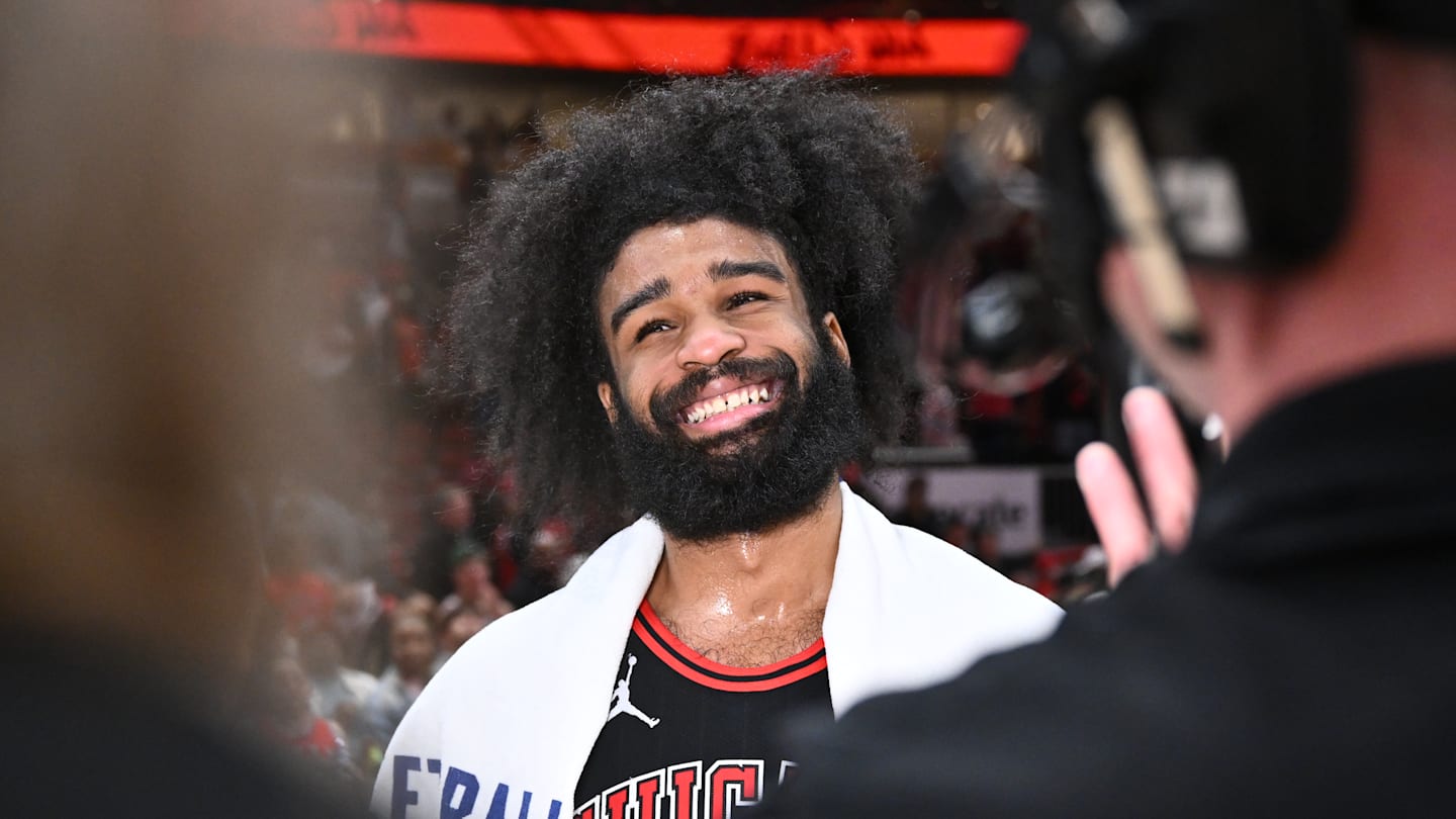 Chicago Bulls guard Coby White smiles during a postgame interview after a Play-In Tournament game against the Atlanta Hawks.