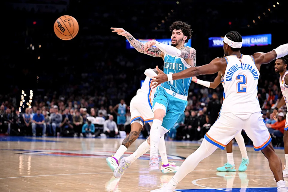 OKLAHOMA CITY, OKLAHOMA - JANUARY 5: Lamelo Ball #1 of the Charlotte Hornets attempts a pass during the first half against the Oklahoma City Thunder at Paycom Center on January 5, 2026 in Oklahoma City, Oklahoma. NOTE TO USER: User expressly acknowledges and agrees that, by downloading and or using this photograph, User is consenting to the terms and conditions of the Getty Images License Agreement. (Photo by Joshua Gateley/Getty Images)