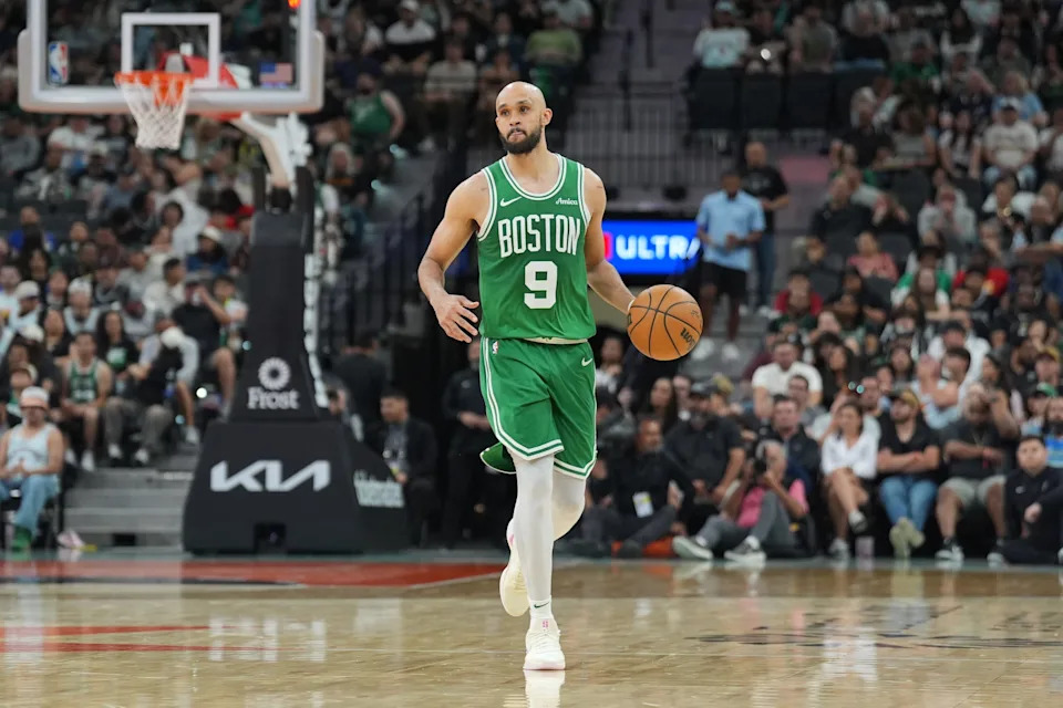 Mar 29, 2025; San Antonio, Texas, USA; Boston Celtics guard Derrick White (9) dribbles up the court in the second half against the San Antonio Spurs at Frost Bank Center. Mandatory Credit: Daniel Dunn-Imagn Images