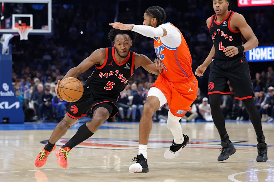 Jan 25, 2026; Oklahoma City, Oklahoma, USA; Toronto Raptors guard Immanuel Quickley (5) drives down the court as Oklahoma City Thunder guard Isaiah Joe (11) defends during the second half at Paycom Center. Mandatory Credit: Alonzo Adams-Imagn Images