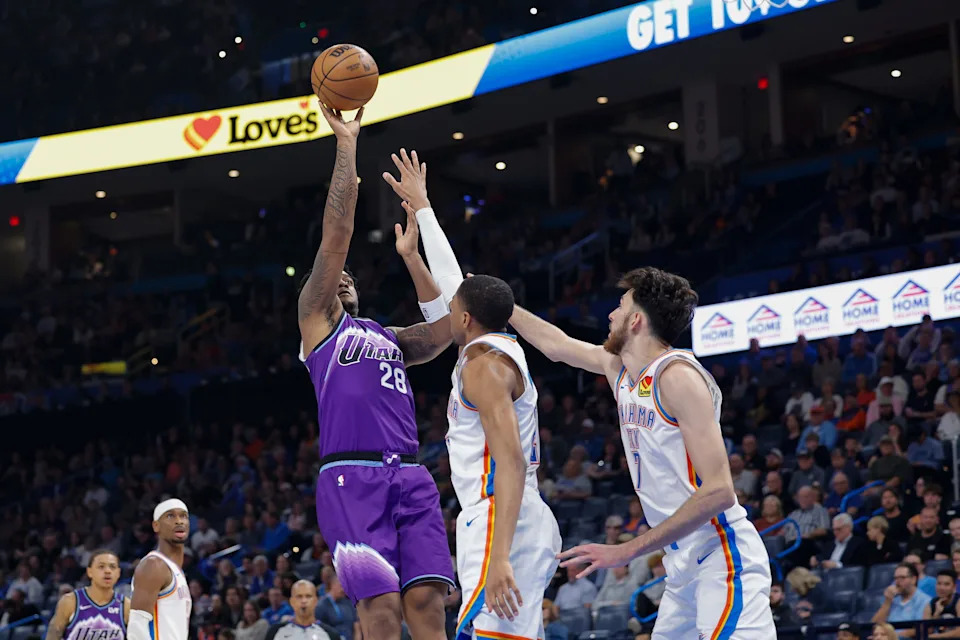 Jan 7, 2026; Oklahoma City, Oklahoma, USA; Utah Jazz forward Brice Sensabaugh (28) shoots over Oklahoma City Thunder guard Aaron Wiggins (21) during the second half at Paycom Center. Mandatory Credit: Alonzo Adams-Imagn Images
