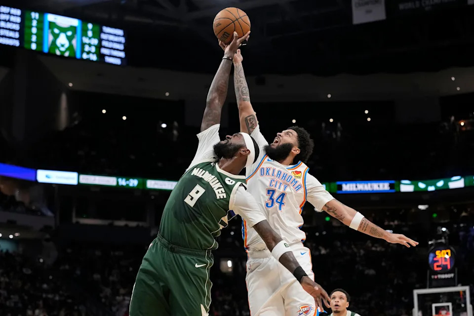 MILWAUKEE, WISCONSIN - JANUARY 21: Bobby Portis #9 of the Milwaukee Bucks rebounds the ball against Kenrich Williams #34 of the Oklahoma City Thunder during the second quarter at Fiserv Forum on January 21, 2026 in Milwaukee, Wisconsin. NOTE TO USER: User expressly acknowledges and agrees that, by downloading and or using this photograph, User is consenting to the terms and conditions of the Getty Images License Agreement. (Photo by Patrick McDermott/Getty Images)