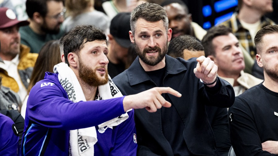 Utah Jazz forward Kevin Love, right, talks with center Jusuf Nurkić...