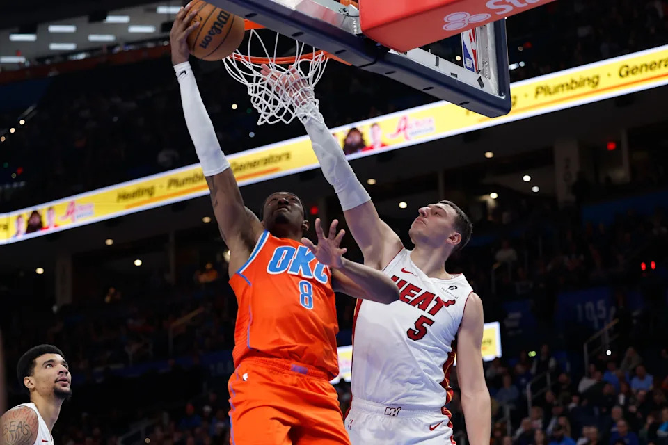 Jan 11, 2026; Oklahoma City, Oklahoma, USA; Oklahoma City Thunder guard/forward Jalen Williams (8) goes up for a basket as Miami Heat forward Nikola Jović (5) defends during the second half at Paycom Center. Mandatory Credit: Alonzo Adams-Imagn Images