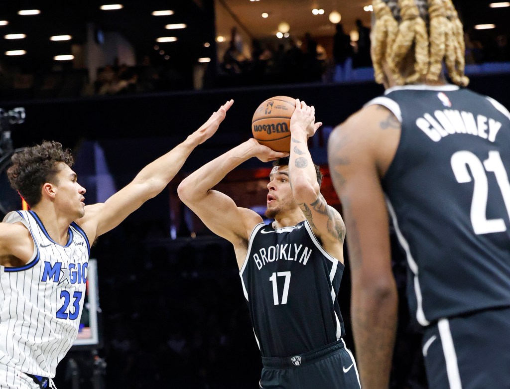 Brooklyn Nets forward Michael Porter Jr. (17) takes a shot during the first half against the Orlando Magic.