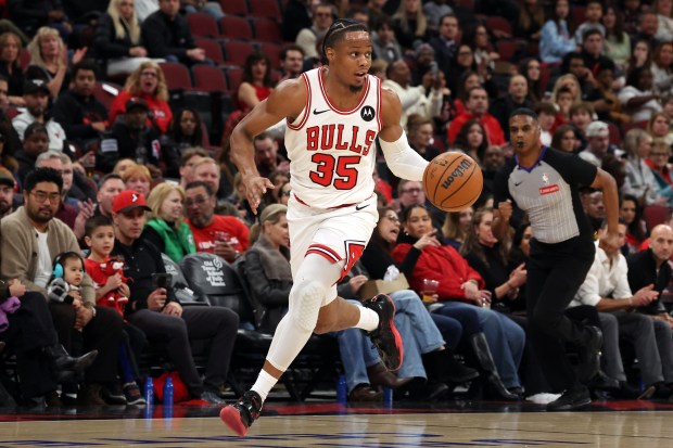 Bulls forward/guard Isaac Okoro (35) brings the ball up court against the Pelicans in the first half at the United Center on Wednesday, Dec. 31, 2025. (Terrence Antonio James/Chicago Tribune)
