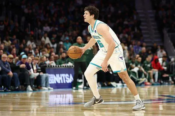PJ Hall of the Charlotte Hornets dribbles during the first quarter of the game against the Milwaukee Bucks at Spectrum Center. Jared C. Tilton/Getty Images