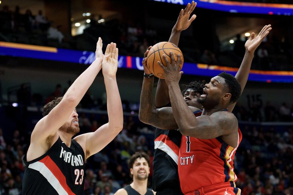 New Orleans Pelicans forward Zion Williamson (1) shoots against Portland Trail Blazers center...