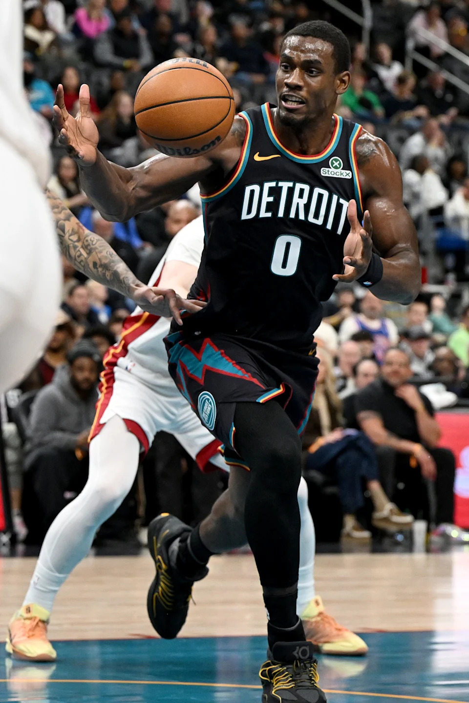 Detroit Pistons center Jalen Duren (0) grabs an offensive rebound against the Miami Heat in the first quarter at Little Caesars Arena in Detroit on Thursday, Jan. 1, 2026.