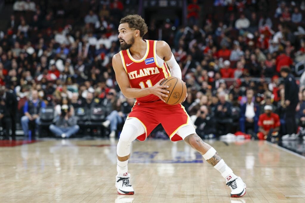 Oct 27, 2025; Chicago, Illinois, USA; Atlanta Hawks guard Trae Young (11) looks to pass the ball against the Chicago Bulls during the second half at United Center. Mandatory Credit: Kamil Krzaczynski-Imagn Images