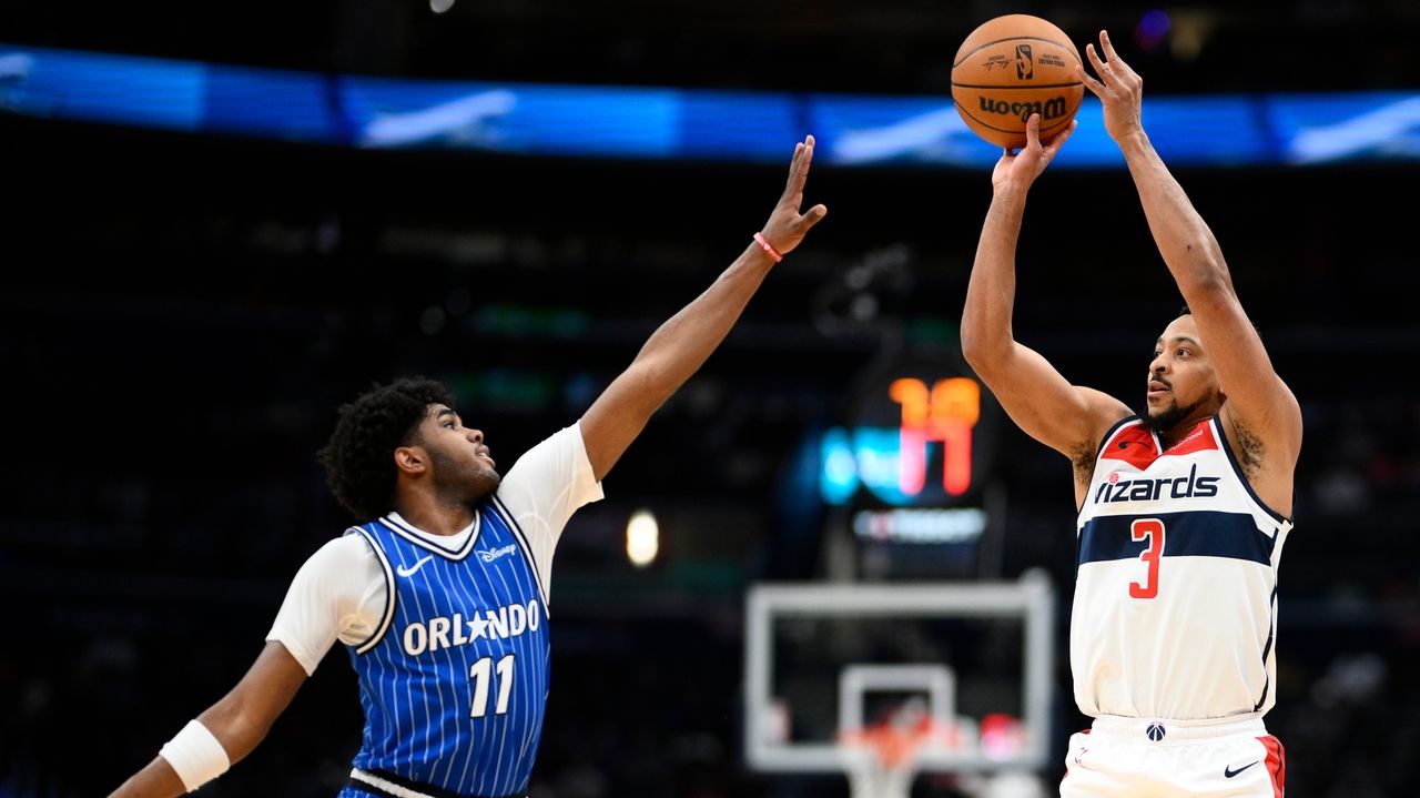 CJ McCollum steadies Wizards in 4th quarter of 120-112 win over Magic