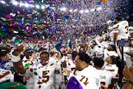 Miami players celebrate after the trophy presentation of a CFP quarterfinal game against...