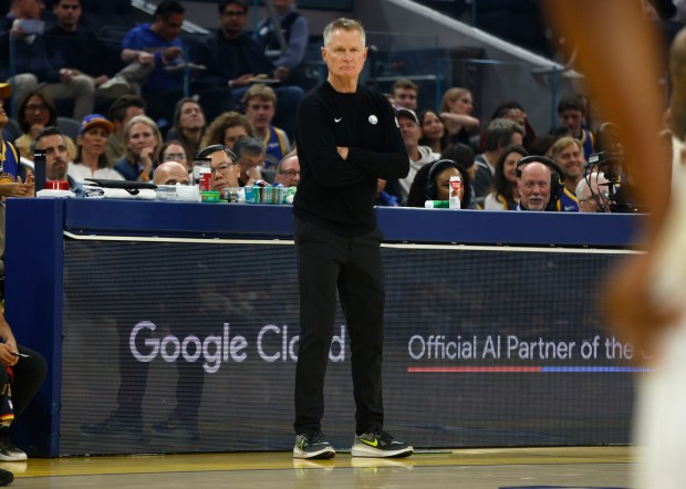 Golden State Warriors head coach Steve Kerr keeps an eye on the game against the Milwaukee Bucks in the first quarter at the Chase Center in San Francisco, Calif., on Wednesday, Jan. 7, 2026. (Nhat V. Meyer/Bay Area News Group)
