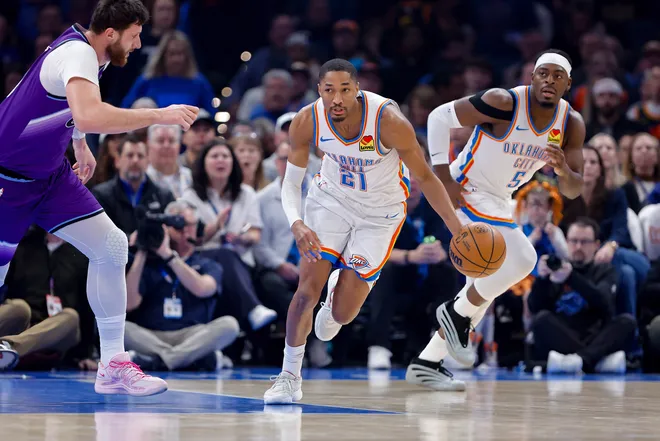 Jan 7, 2026; Oklahoma City, Oklahoma, USA; Oklahoma City Thunder guard Aaron Wiggins (21) dribbles down the court against the Utah Jazz during the first quarter at Paycom Center. Mandatory Credit: Alonzo Adams-Imagn Images