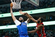 Dallas Mavericks forward Anthony Davis (3) makes a shot while Miami Heat forward Andrew...