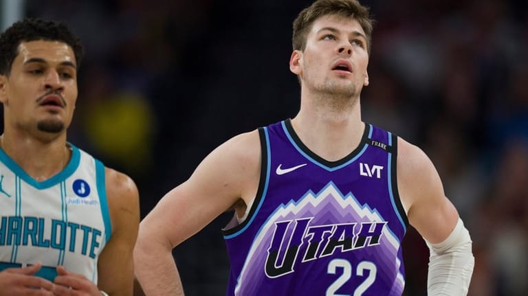 Utah Jazz center Kyle Filipowski (22) reacts as Charlotte Hornets...