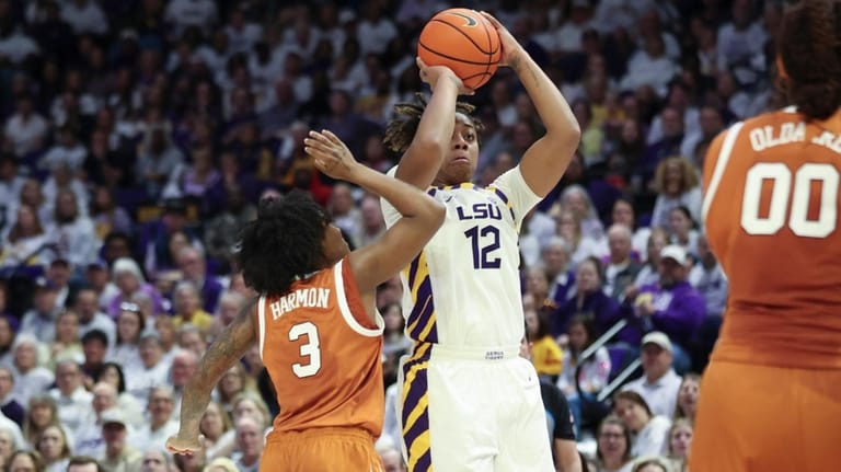 LSU guard Mikaylah Williams (12) looks to shoot a jumper...