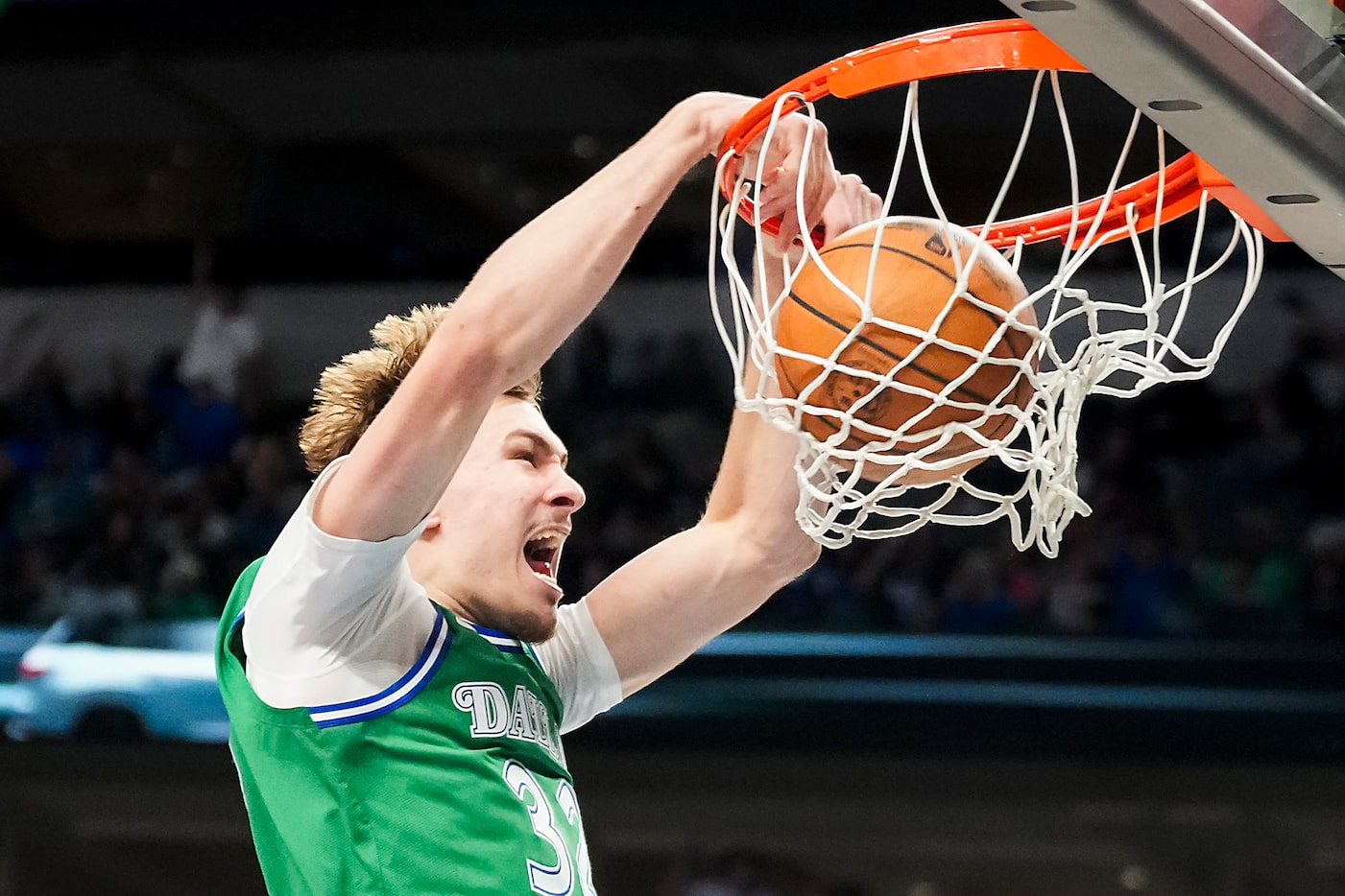 Dallas Mavericks forward Cooper Flagg (32) dunks the ball during the second half of an NBA...