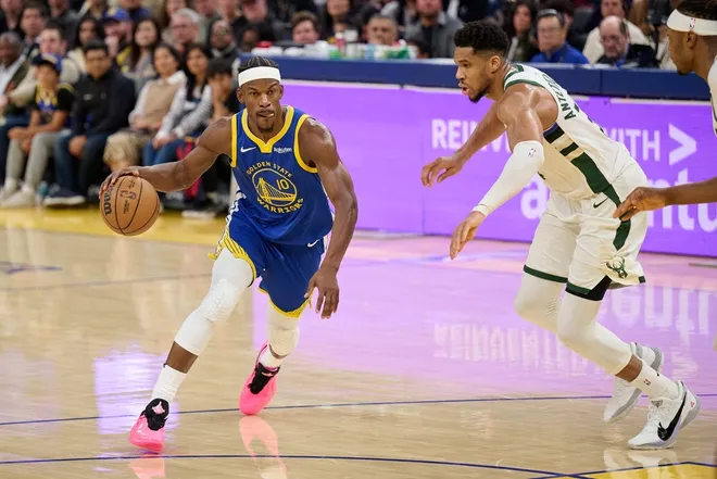 Jan 7, 2026; San Francisco, California, USA; Golden State Warriors forward Jimmy Butler III (10) drives to the basket against Milwaukee Bucks forward Giannis Antetokounmpo (34) during the fourth quarter at Chase Center.