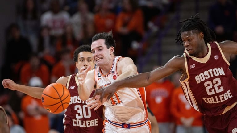 Clemson forward Nick Davidson (11) and Boston College forward Jayden...