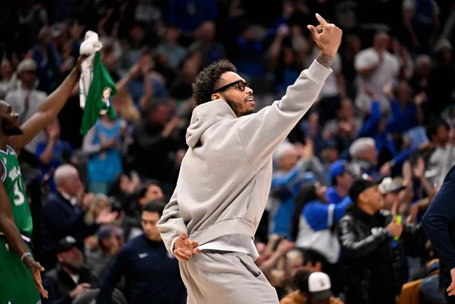 Jan 12, 2026; Dallas, Texas, USA; Dallas Mavericks forward P.J. Washington (25) celebrates a basket by forward Cooper Flagg (not pictured) against the Brooklyn Nets during the second half at the American Airlines Center.