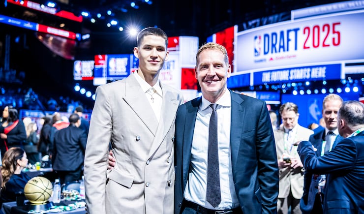 Egor Demin poses for a picture with Travis Hansen after being selected No. 8 overall in the NBA draft by the Brooklyn Nets Wednesday, June 25, 2025.