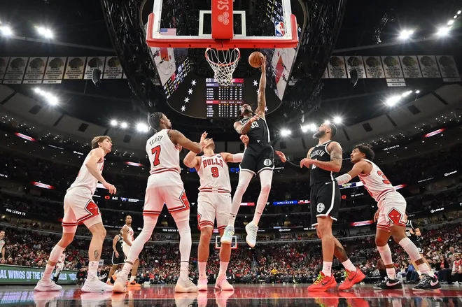 Jan 18, 2026; Chicago, Illinois, USA; Brooklyn Nets center Nic Claxton (33) shoots against the Chicago Bulls during the first half at United Center.