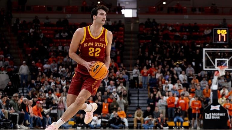 Iowa State forward Milan Momcilovic (22) prepares to shoot the...
