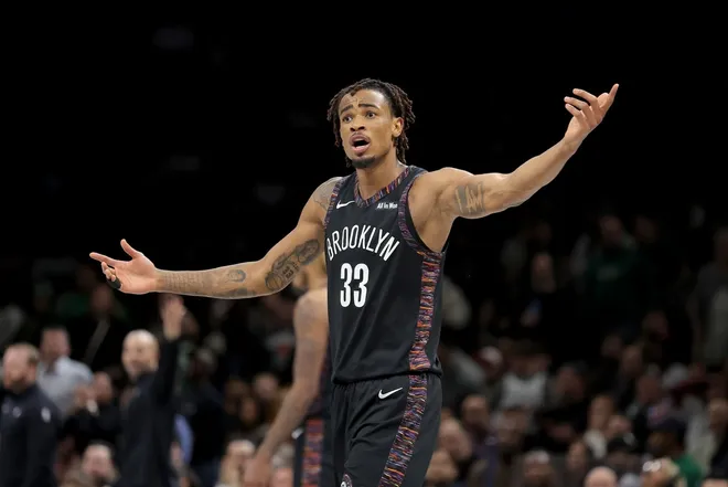 Jan 23, 2026; Brooklyn, New York, USA; Brooklyn Nets center Nic Claxton (33) reacts during the fourth quarter against the Boston Celtics at Barclays Center.