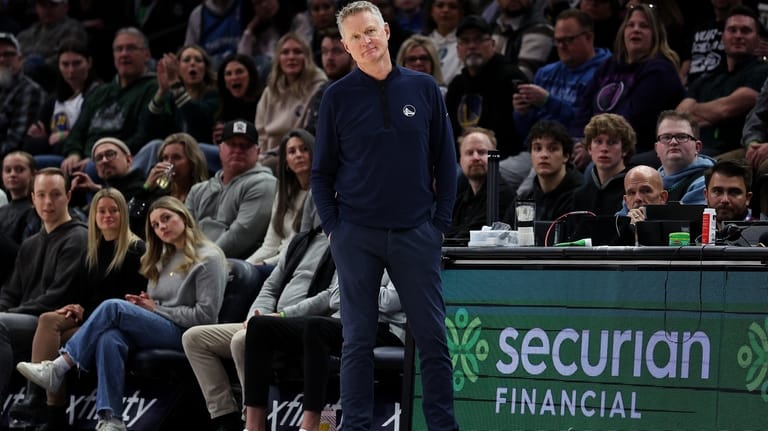 Golden State Warriors head coach Steve Kerr reacts during the...