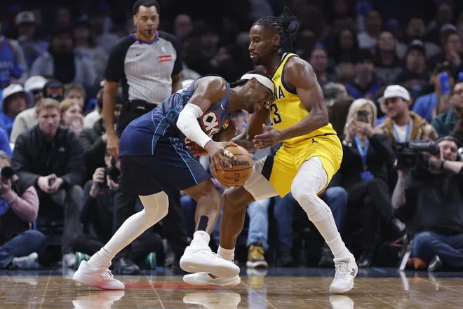 Jan 23, 2026; Oklahoma City, Oklahoma, USA; Oklahoma City Thunder guard Shai Gilgeous-Alexander (2) drives to the basket against Indiana Pacers guard/forward Aaron Nesmith (23) during the second half at Paycom Center.