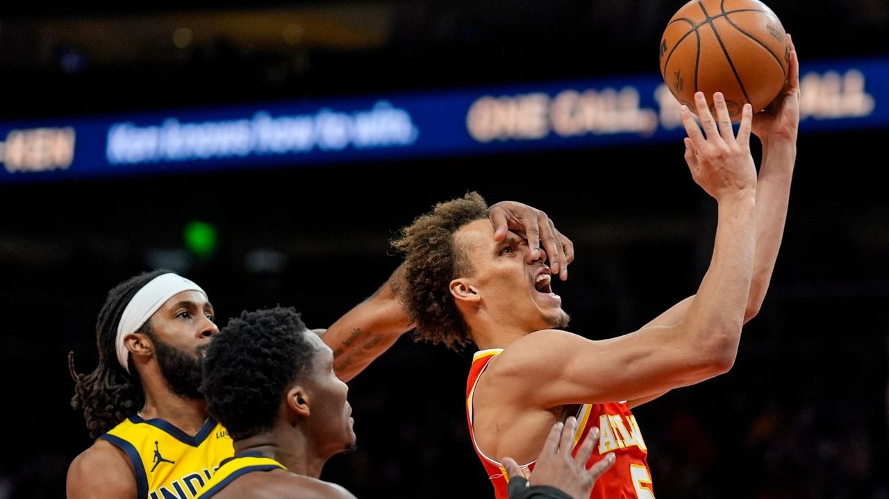 CJ McCollum scores 23 points and Hawks ride 17-0 second-half run to charge past Pacers 132-116