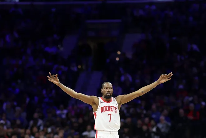 Jan 22, 2026; Philadelphia, Pennsylvania, USA; Houston Rockets forward Kevin Durant (7) reacts to a three pointer against the Philadelphia 76ers during the fourth quarter at Xfinity Mobile Arena.