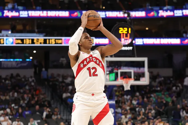 DALLAS, TEXAS - OCTOBER 26: Collin Murray-Boyles #12 of the Toronto Raptors takes a three point shot during a game against the Dallas Mavericks at American Airlines Center on October 26, 2025 in Dallas, Texas. NOTE TO USER: User expressly acknowledges and agrees that, by downloading and or using this photograph, User is consenting to the terms and conditions of the Getty Images License Agreement. (Photo by Stacy Revere/Getty Images)