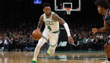Boston Celtics guard Anfernee Simons attacks Memphis Grizzlies defender Jaylen Wells