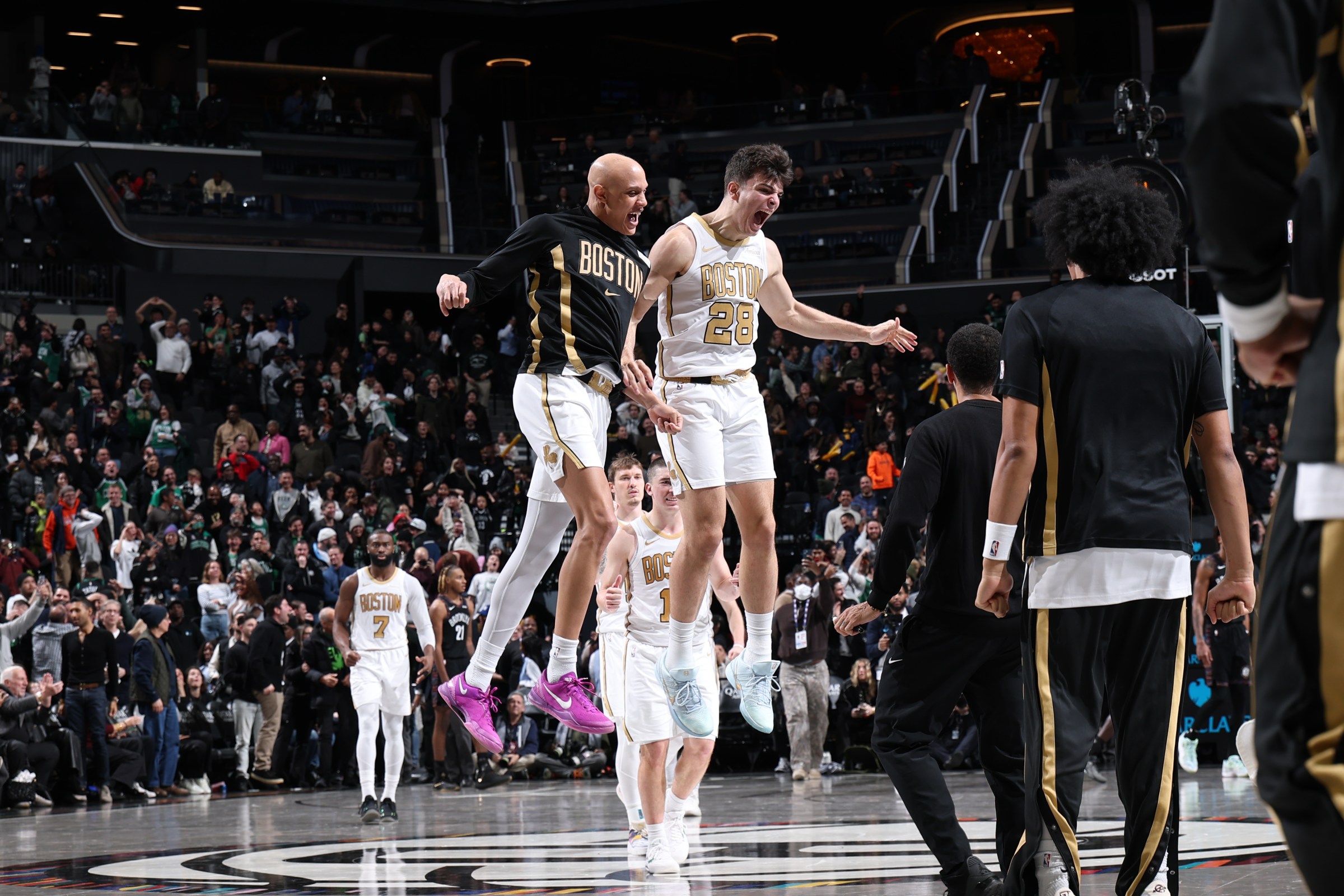 BROOKLYN, NY - JANUARY 23: Jordan Walsh #27 and Hugo Gonzalez #28 of the Boston Celtics celebrates during the game against the Brooklyn Nets on January 23, 2026 at Barclays Center in Brooklyn, New York. NOTE TO USER: User expressly acknowledges and agrees that, by downloading and or using this photograph, User is consenting to the terms and conditions of the Getty Images License Agreement. Mandatory Copyright Notice: Copyright 2026 NBAE (Photo by David L. Nemec/NBAE via Getty Images)